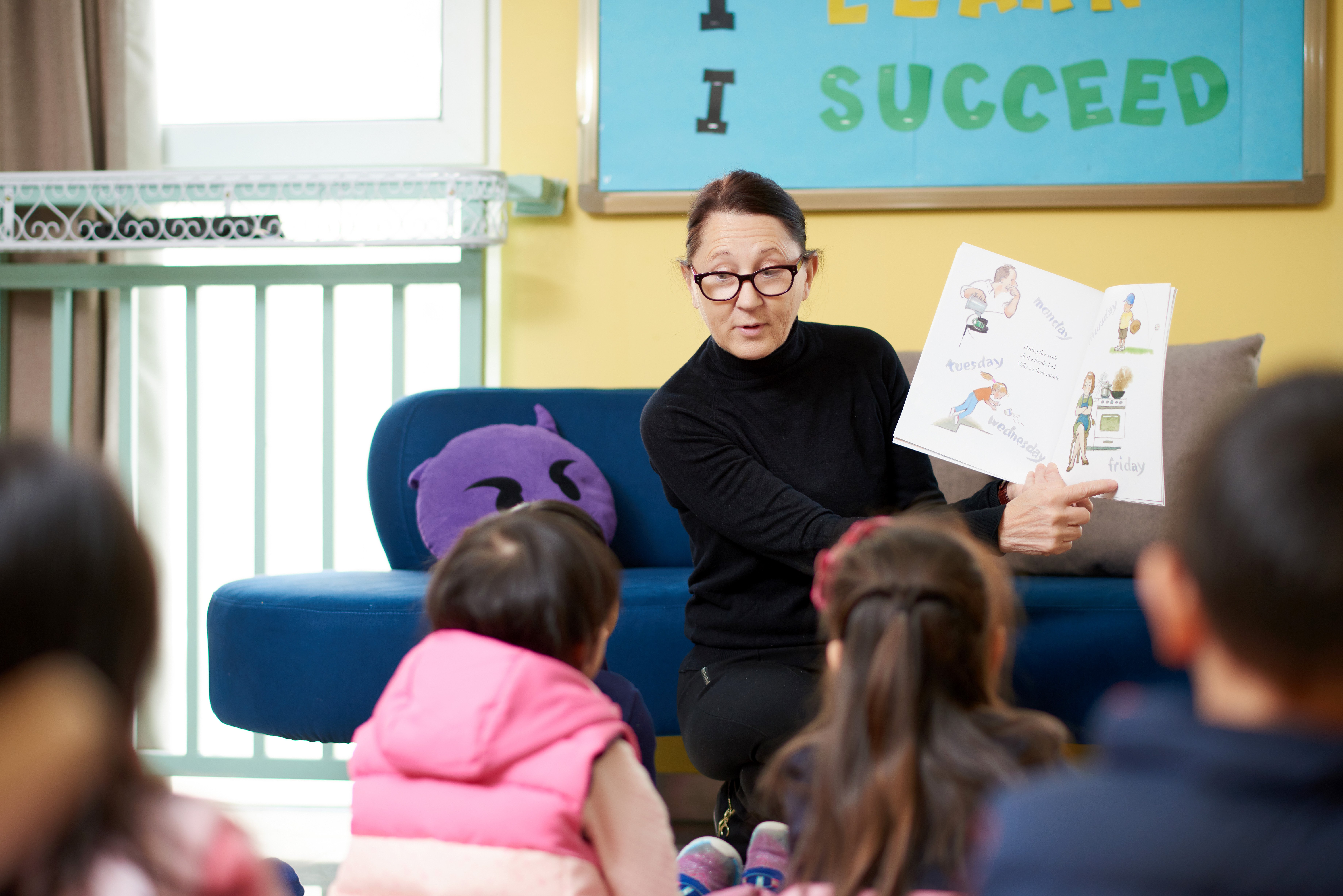 Our Librarian reading to children
